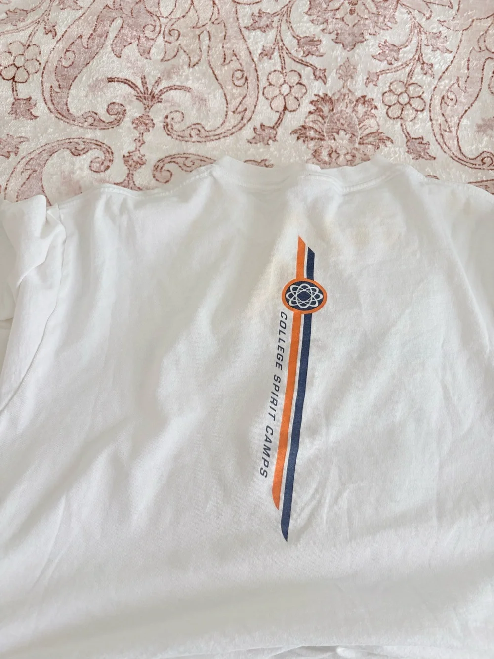 Nike White UCA Cheerleading Short Sleeve Tee with Navy and Orange Logo